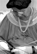 Marian Bowers making a palmetto stem basket - Brighton Seminole Indian Reservation, Florida.