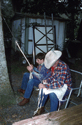 Cow whip maker George "Junior" Mills (r) and his apprentice J. Taylor Marcus at work - Okeechobee, Florida.