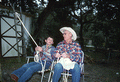 Cow whip maker George "Junior" Mills (r) and his apprentice J. Taylor Marcus working - Okeechobee, Florida.