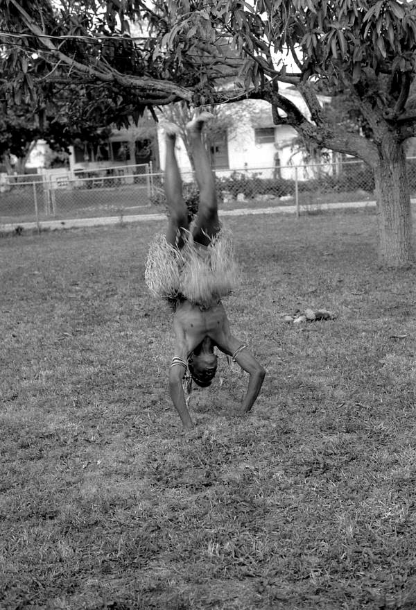 Nigerian acrobatic dance apprentice Akila Baki practicing - North Miami, Florida.
