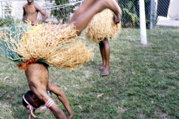 Dancer performing Nigerian acrobatic dance - North Miami, Florida.
