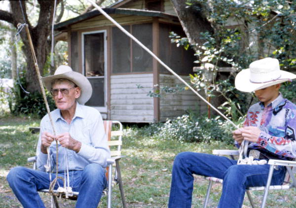 Apprentice J. Taylor Marcus learning about the plaiting of cow whips from whip maker George "Junior" Mills - Okeechobee, Florida.