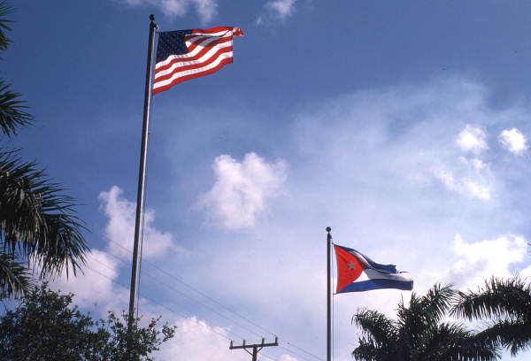 Cuban and American flags flying at Osceola Farms - Pahokee, Florida