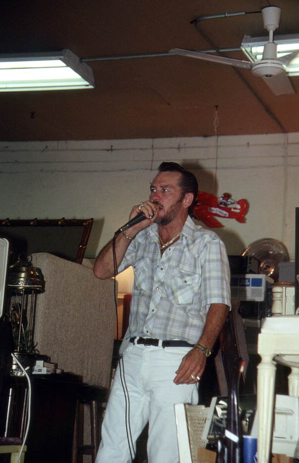 John Larison auctioneering - West Palm Beach, Florida.