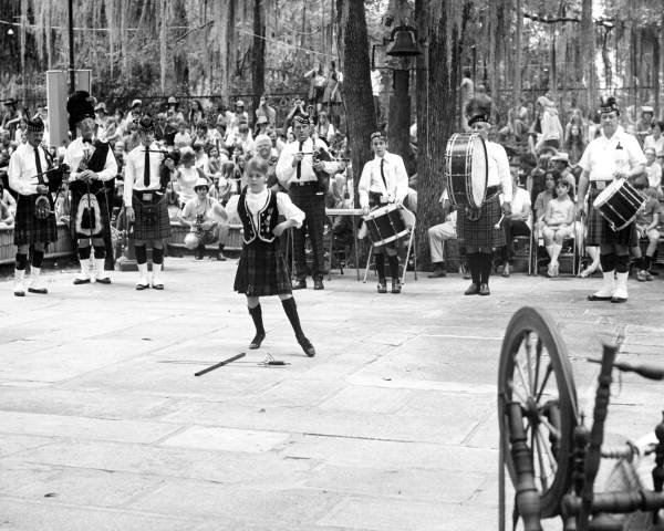 Scottish pipe band and dancer from Jacksonville performing at the 1972 Florida Folk Festival - White Springs, Florida.
