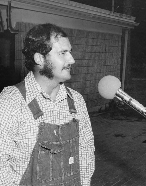 Bird and animal sounds imitator Tommy Dobbs of Palatka performing at the 1977 Florida Folk Festival - White Springs, Florida.