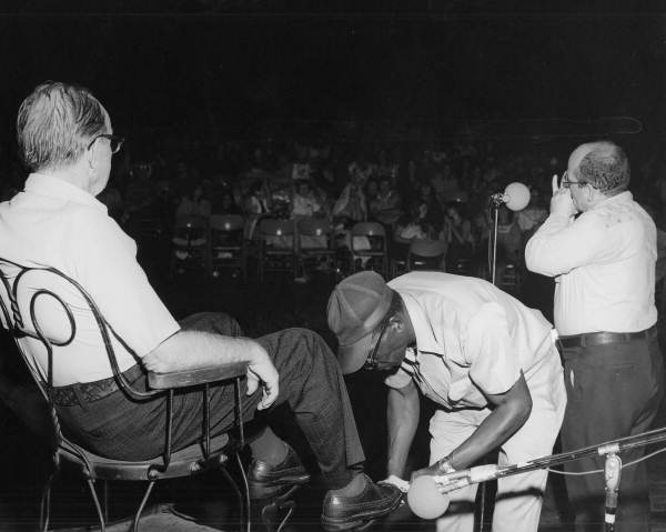 Frank Mitchell (center) performing "Shoeshine Rag", accompanied by George Heaps-Nelson on harmonica at the 1977 Florida Folk Festival - White Springs, Florida