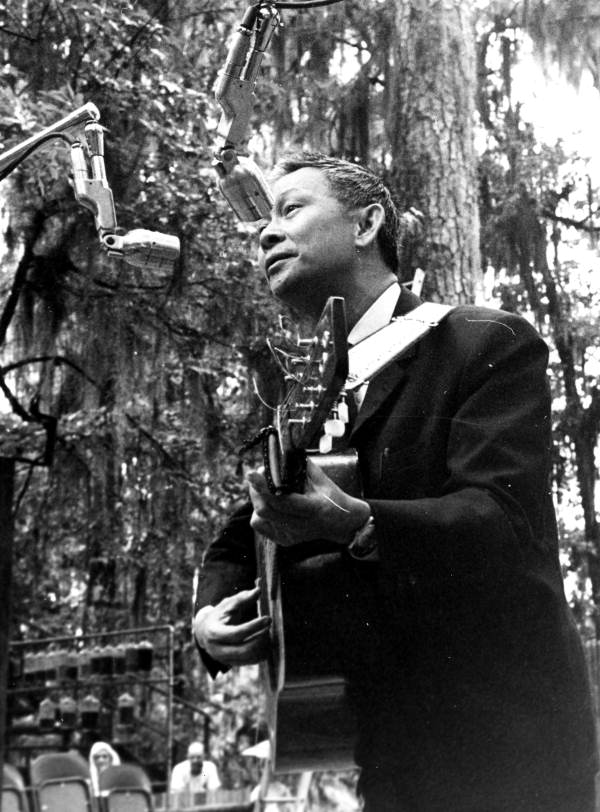 Vietnamese folk singer Pham Duy performing at the 1966 Florida Folk Festival - White Springs, Florida