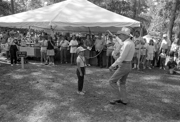 Curly Dekle demonstrating whip cracking at the 1988 Florida Folk Festival - White Springs, Florida