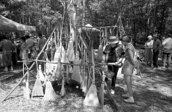 Display of brooms made by Bill Case at the 1988 Florida Folk Festival - White Springs, Florida