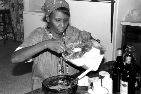 Liliane N. Louis making beignets - Miami, Florida