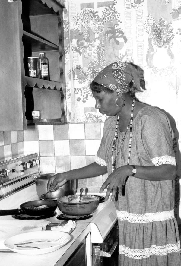 Liliane N. Louis making beignets - Miami, Florida.
