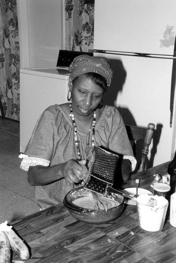 Liliane N. Louis making beignets - Miami, Florida.