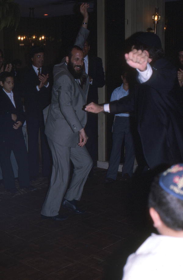 Men Chassidic dancing at Korf bar mitzvah - Miami Beach, Florida.
