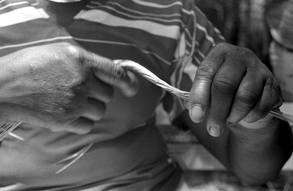 Margaret Garrison starting to create a sweetgrass basket - White Springs, Florida