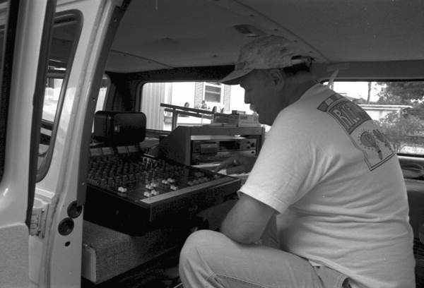 Technician works in the recording van- Immokalee, Florida