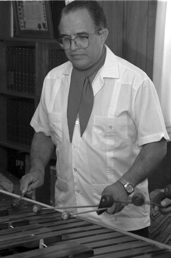 Close up of one of the members of Marimba Mayalandia perform in the Rivera residence - Orlando, Florida.