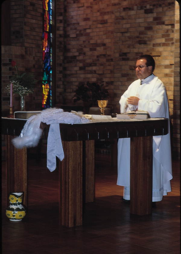 Priest at a Quinceanera mass - Apopka, Florida