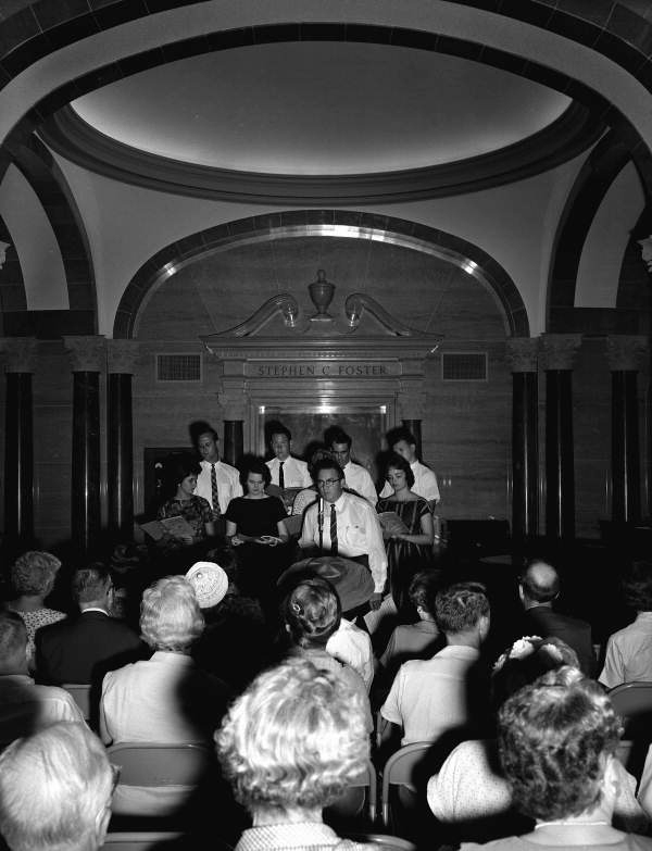 Director Dr. Delbert Sterrett introducing the University of Florida's glee club at the Stephen Foster Center - White Springs, Florida