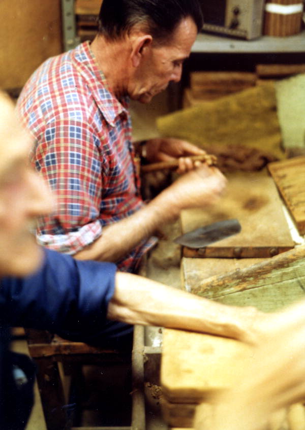 Man making cigars