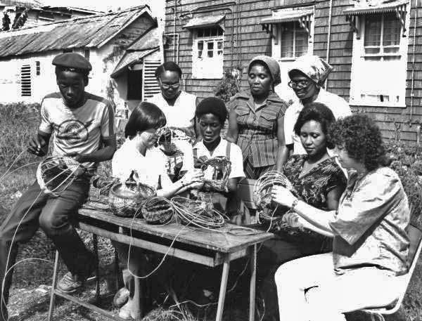 Folklorists Merri Belland and Peggy Bulger lead a weaving class in Jamaica- Jamaica