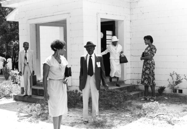 People walking out of Mt. Olive Primitive Baptist Church- Lamont, Florida