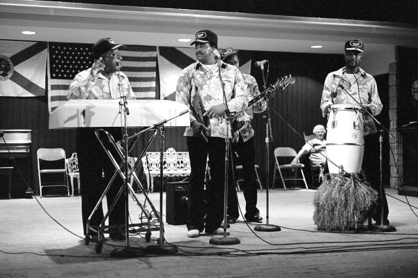 Key West Island Junkanoos performing calypso music at the 1983 Florida Folk Festival - White Springs, Florida