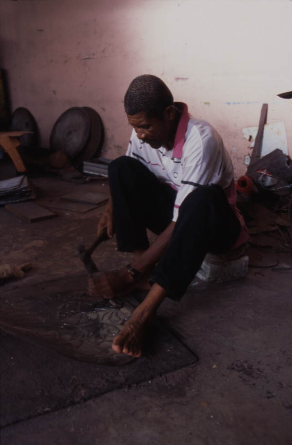 Almann Ulysse works on art - Miami, Florida.