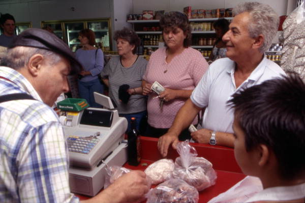 Customers and butchers at Acropolis Meat Market - Tarpon Springs, Florida.