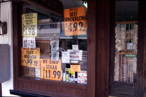 Advertisements at Acropolis Meat Market - Tarpon Springs, Florida.