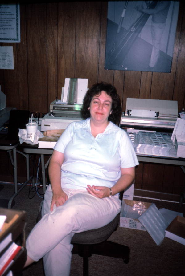 Folklorist Nancy Michael working at her desk at the Florida Folklife Archive- White Springs, Florida