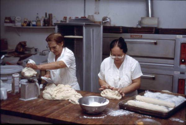 Nomiki Tsimouris (r) and Ekaterini Rebas (l) make Greek bread - Tarpon Springs, Florida.
