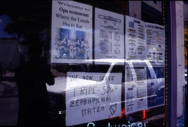 Menu and signs for the Opa Restaurant - Tarpon Springs, Florida.