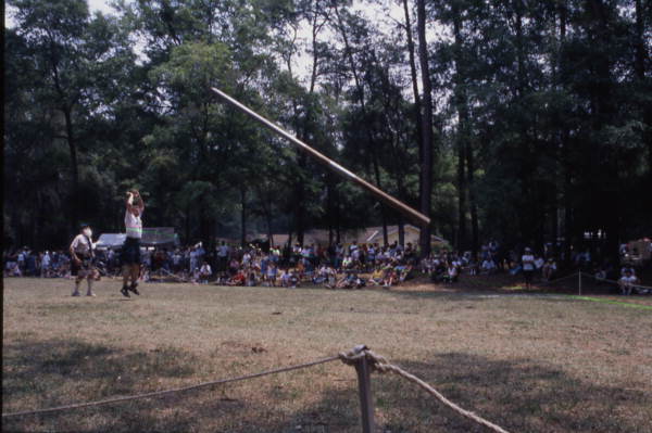 Herman and Louise Ibock perform a caber toss at the Florida Folklife Festival - White Springs, Florida.