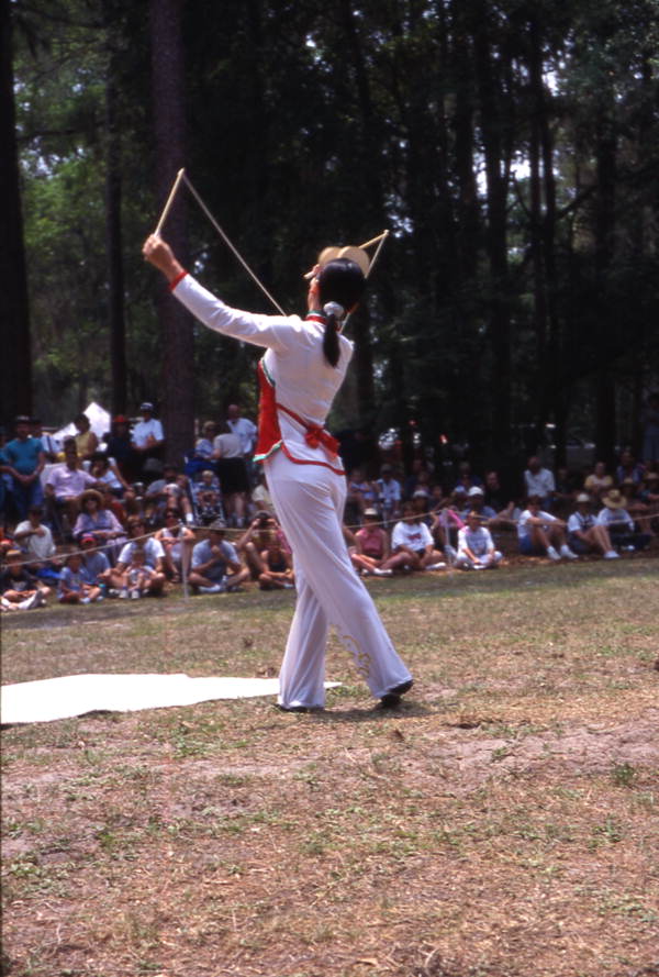 Nan Zhu performs with her Chinese Yo-yo's- White Springs, Florida.