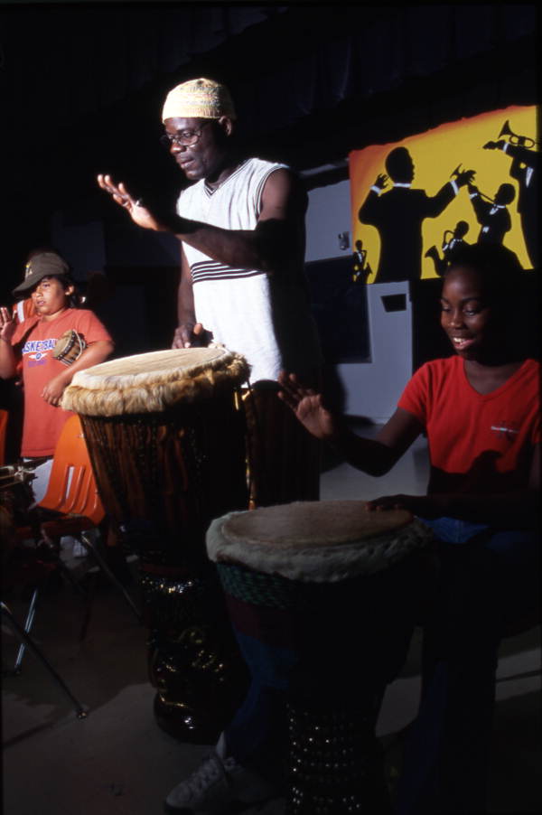 Martin Zagbo plays with children at Lake Westen Elementary School - Orlando, Florida.