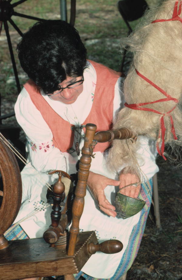 Anne Lunestad spinning flax at the 1977 Florida Folk Festival - White Springs, Florida