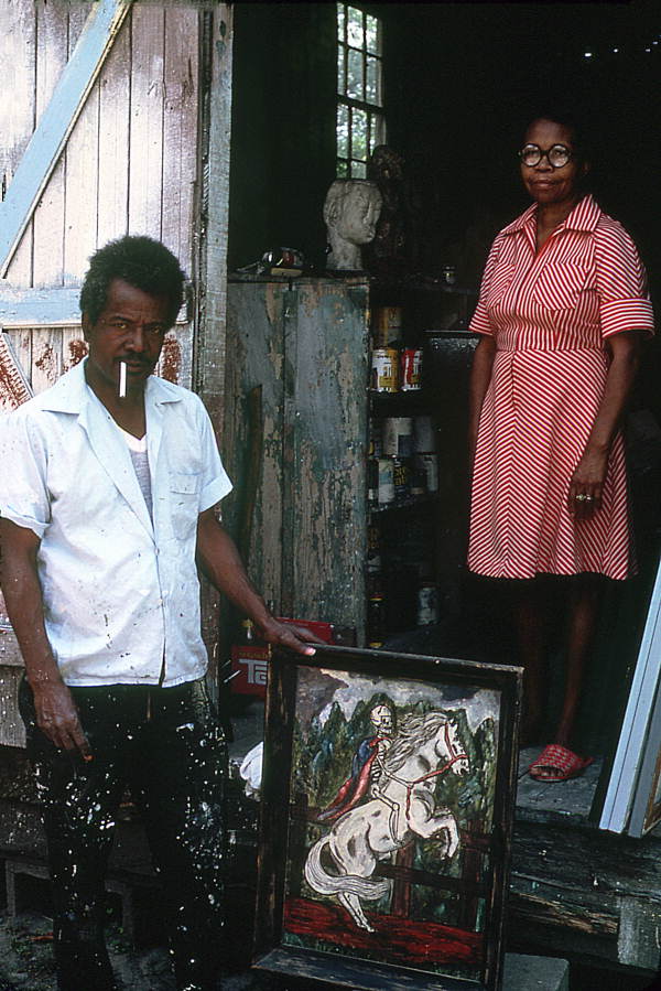 Pharaoh Baker with his painting "Death" - Lake City, Florida