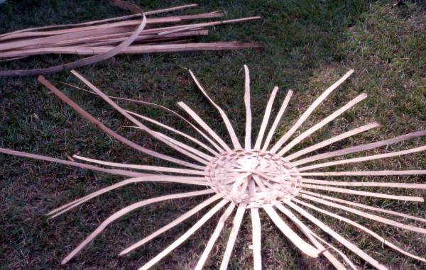 Lucreaty Clark starting to weave a white oak basket