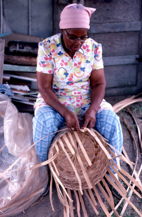 Lucreaty Clark weaving a white oak basket