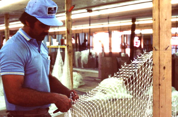 Billy Burbank III weaving a fishing net - Fernandina Beach, Florida