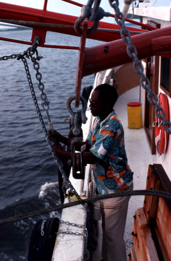 Unidentified shrimper at work aboard the "Capt. Daddy" - Fernandina Beach, Florida