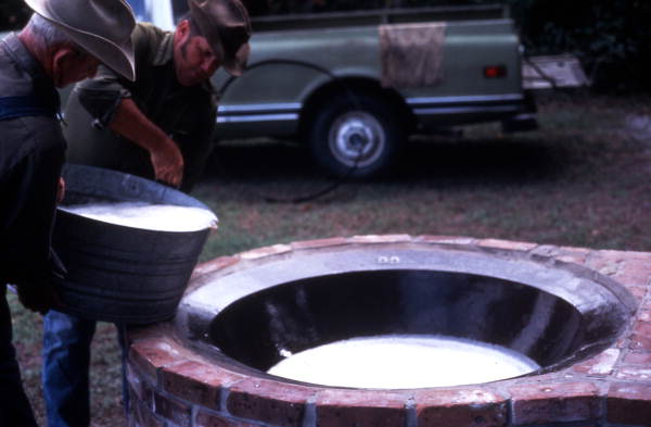 Pouring out sugar cane syrup - Orlando, Florida.