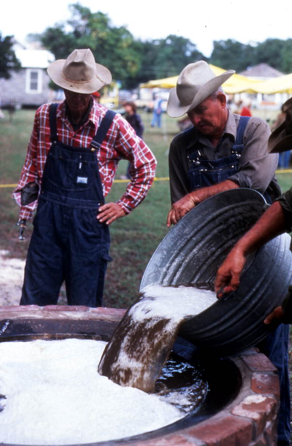 Pouring out sugar cane syrup - Orlando, Florida.