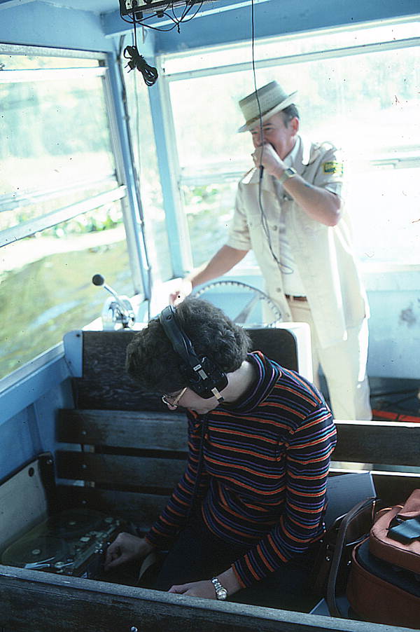 Tour boat guide George Bower being recorded by folklorist Doris J. Dyen - Wakulla Springs, Florida