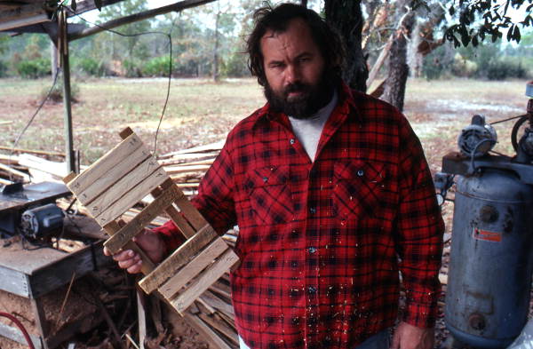 Steve Moody holding the top to the stone crab trap he is making - Perry, Florida