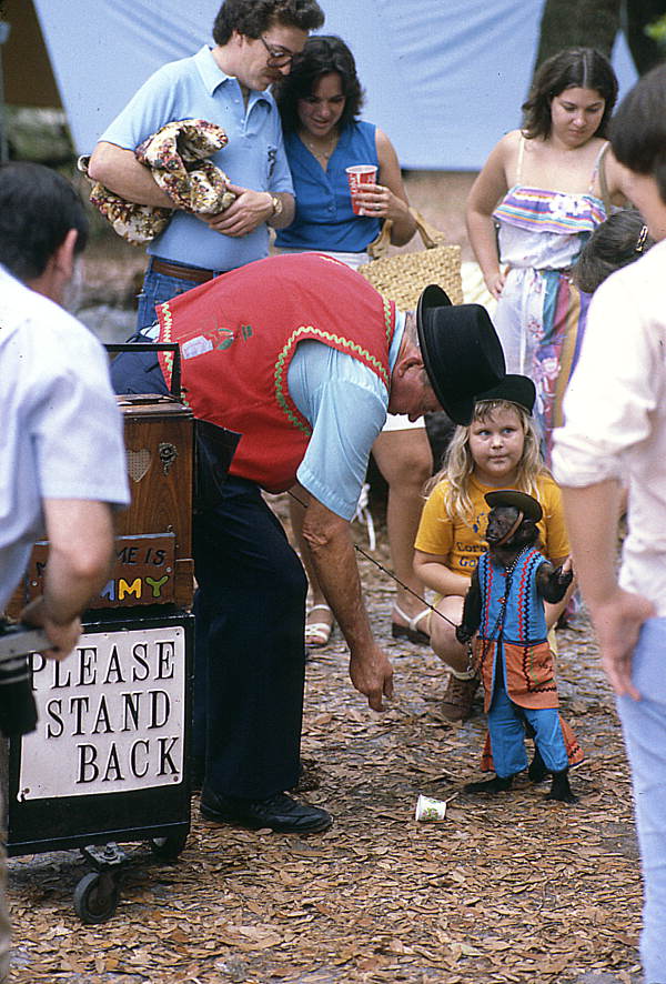 Man and his monkey, which are part of a medicine show, at the 1982 Florida Folk Festival - White Springs, Florida.