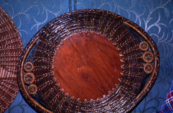 Tray of pine needles and wooden base made by Mebelen Holloway - Lake City, Florida.