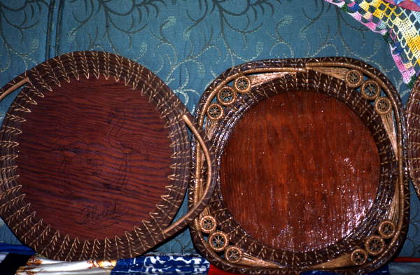 Pine needle and wooden base trays made by Mebelen Holloway - Lake City, Florida.