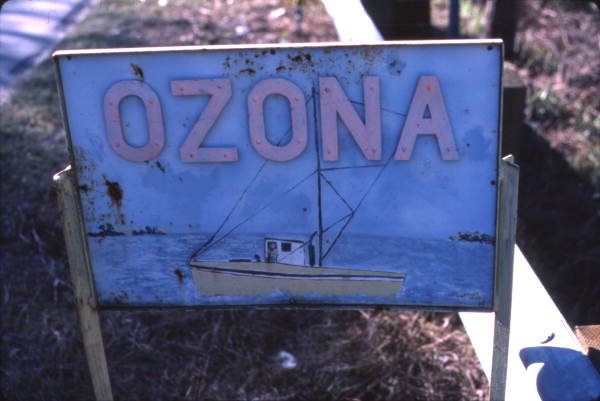 Close-up view of Ozona city limit sign.
